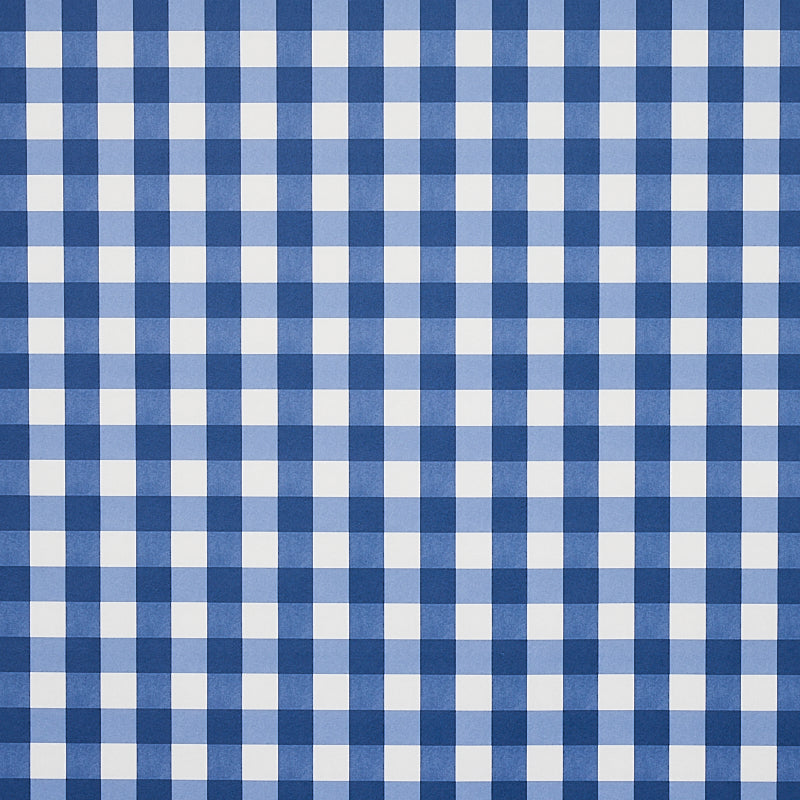 Willa Check Small navy blue gingham plaid wallpaper by Schumacher shown in close-up and installed in a kitchen setting.