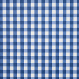 Willa Check Small navy blue gingham plaid wallpaper by Schumacher shown in close-up and installed in a kitchen setting.