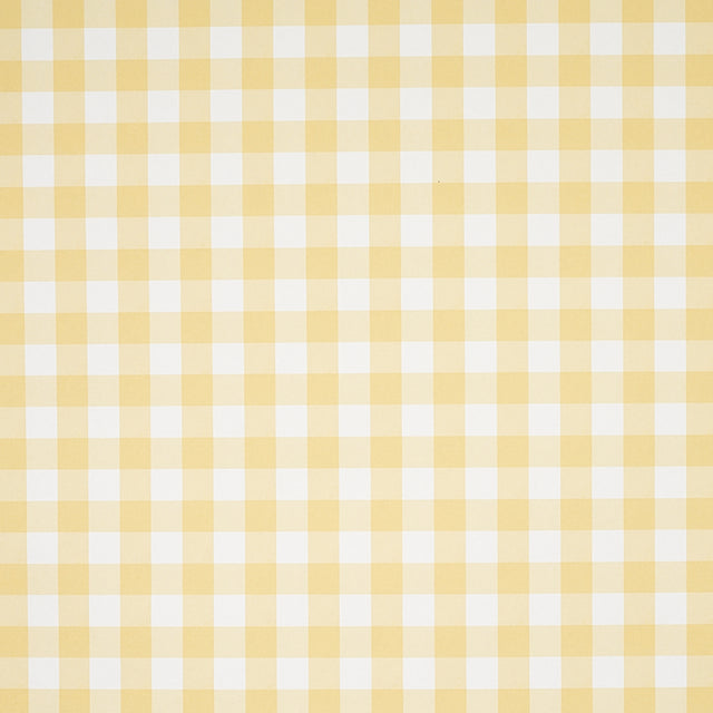 Willa Check Small yellow gingham plaid wallpaper by Schumacher shown in close-up and installed in a bright kitchen interior.