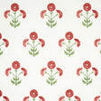 Saranda Flower wallpaper in cardinal red with stylized floral pattern by Schumacher, shown in a bright bathroom setting.