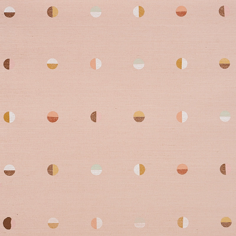 Joshua Tree Hand Printed Sisal wallpaper in Petal by Caroline Z Hurley for Schumacher, featuring hand screen printed moons on a pink sisal background.