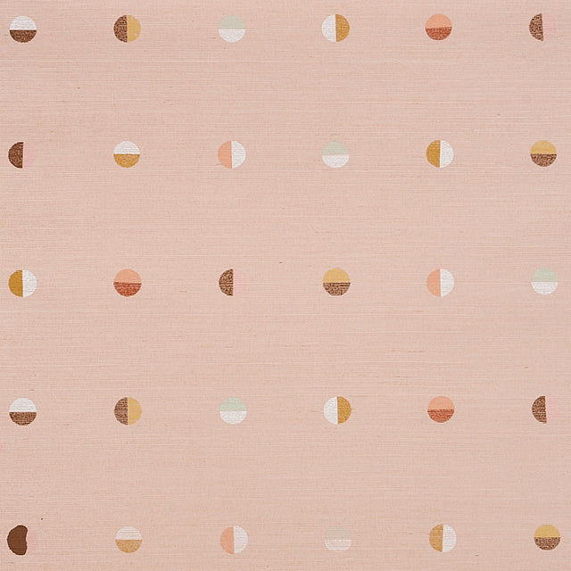 Joshua Tree Hand Printed Sisal wallpaper in Petal by Caroline Z Hurley for Schumacher, featuring hand screen printed moons on a pink sisal background.
