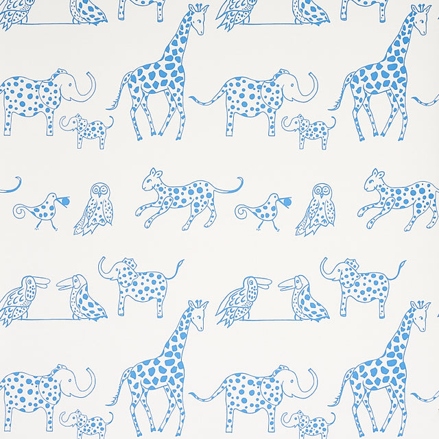 Jungle Jubilee blue wallpaper featuring hand-drawn exotic animals in a playful, mid-sized pattern by Schumacher.