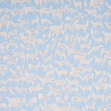 Slate blue wallpaper with hand-drawn white deer in a small-scale, whimsical pattern. Schumacher FAUNA 5012490.