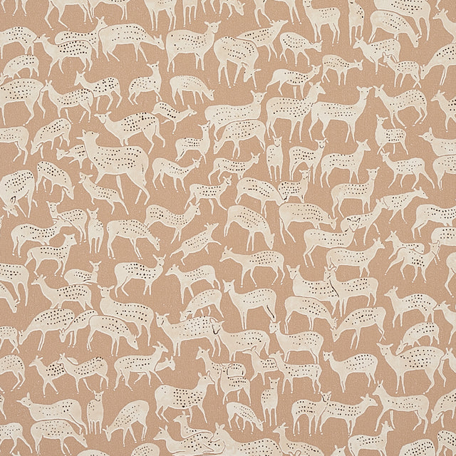 Miniature herds of hand-drawn deer in fawn color on FAUNA wallpaper by Schumacher, Flight of Fancy collection.