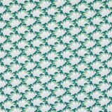 GOTHAM SWING wallpaper in Sage by Schumacher, featuring an Art Deco-inspired fan pattern in green and white tones, shown in detail and installed in a modern interior.
