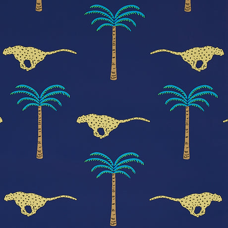 A Wild Desert Dream wallpaper in Midnight by Schumacher featuring cheetahs and palm trees on a deep blue background.
