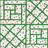 Fancy Beast wallpaper in Safari Green/Ivory by Cristina Buckley for Schumacher, featuring a chic leopard spot and trellis motif.