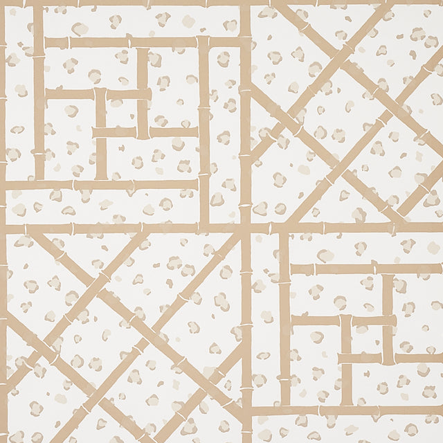 Fancy Beast Sand by Cristina Buckley for Schumacher. Hollywood Regency inspired wallpaper with a sand and ivory leopard spot and trellis motif.