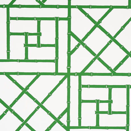 Safari green bamboo trellis pattern wallpaper by Schumacher, designed by Cristina Buckley, shown in a bright entryway.