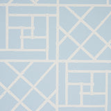 Trellis Sky Blue wallpaper by Cristina Buckley for Schumacher, featuring a bamboo fretwork geometric pattern in light blue and white.