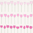 Edie wallpaper in Pink Ladies by Cristina Buckley for Schumacher, featuring rows of stylized pink flowers on a light background.