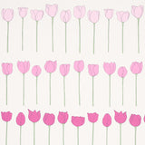 Edie wallpaper in Pink Ladies by Cristina Buckley for Schumacher, featuring rows of stylized pink flowers on a light background.