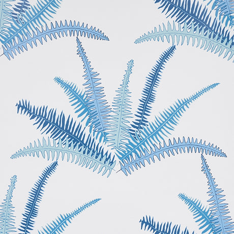 Canyon Ferns Lagoon wallpaper by Schumacher, featuring large-scale blue fern fronds in a botanical pattern, styled in a modern interior.