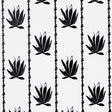 Agave Stripe parchment-colored wallpaper with stylized agave motif in painterly, pebbled stripes by Schumacher, shown in a modern interior setting.