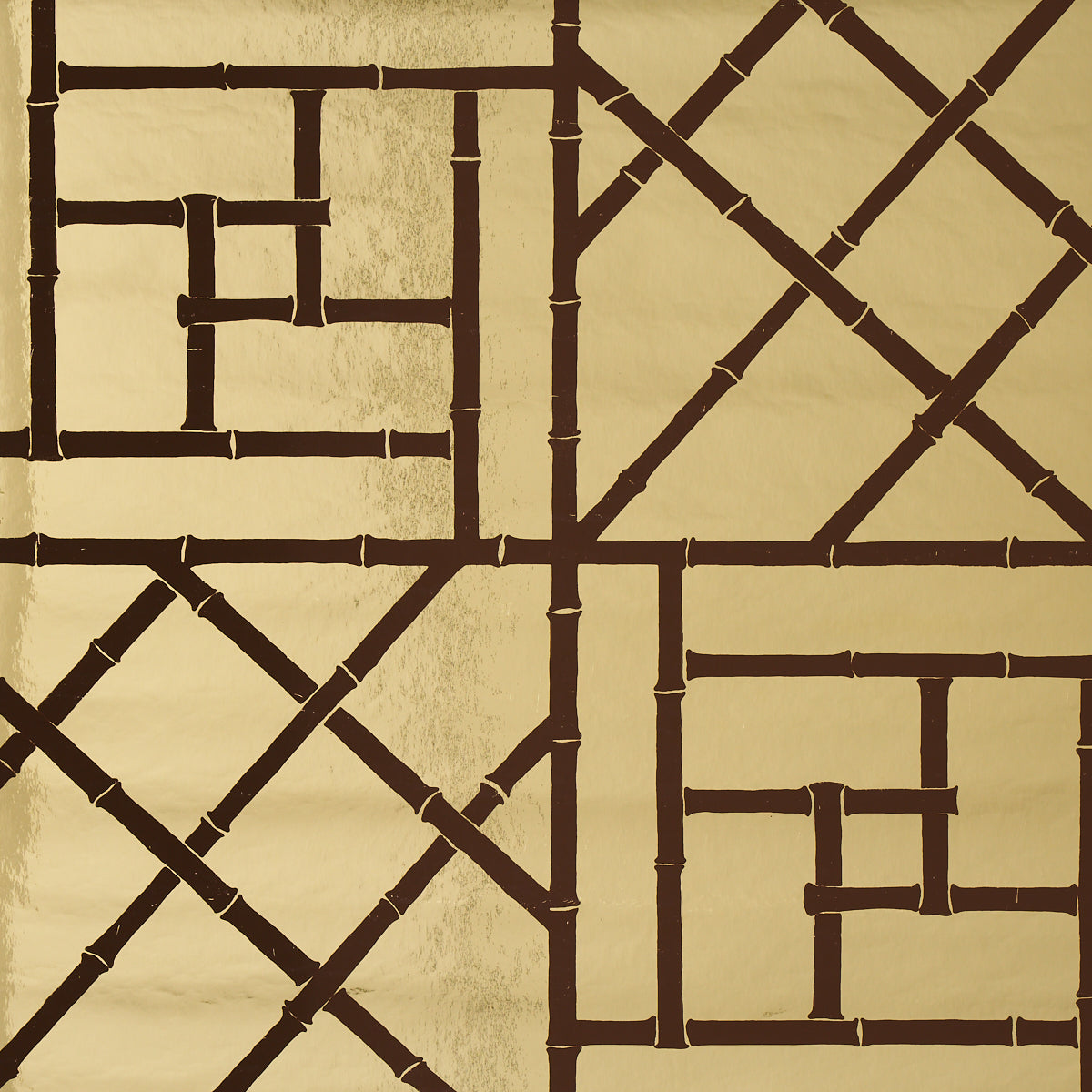 Trellis Metallic wallpaper in Glam Gold by Cristina Buckley for Schumacher, featuring a shiny mylar bamboo fretwork pattern.