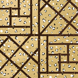 Fancy Beast Metallic wallpaper in Glam Gold by Cristina Buckley for Schumacher, featuring a chic leopard spot and trellis motif with metallic gold background.