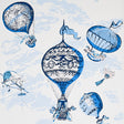 Blue and white wallpaper featuring ornate, painterly hot-air balloons floating among clouds, from Schumacher's Flight Of Fancy collection.