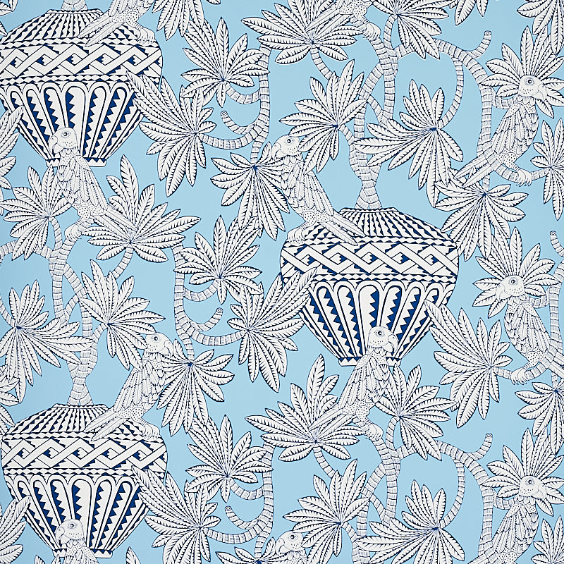 Santarem Sky wallpaper by Schumacher featuring blue and white tropical foliage, parrots, and decorative vases in a whimsical pattern.