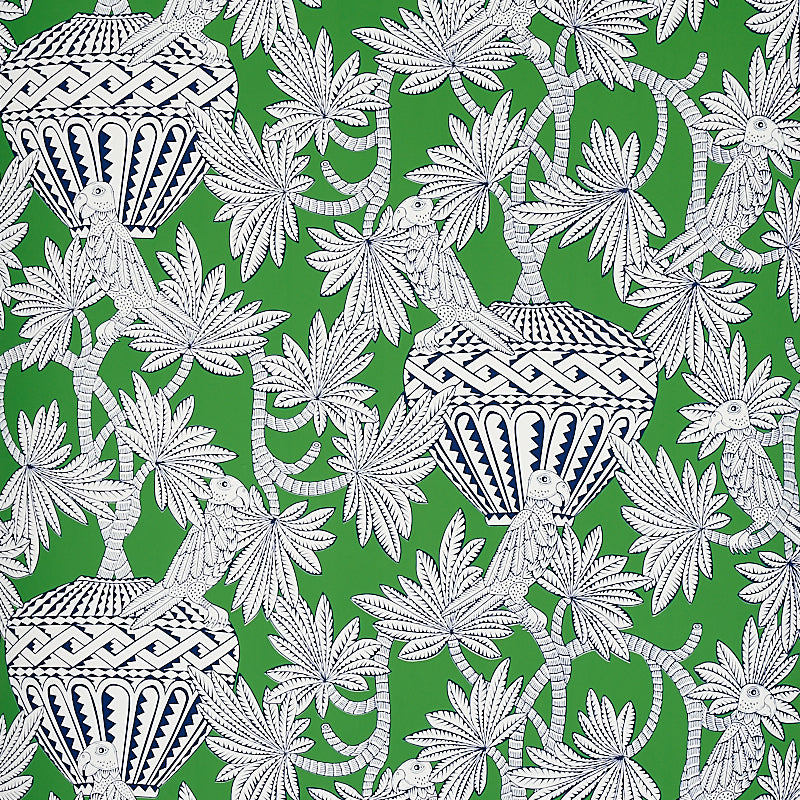 Santarem green wallpaper with white and navy blue tropical palm leaves, parrots, and decorative urns by Schumacher