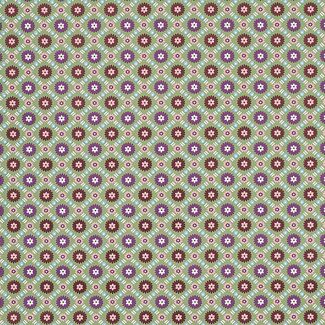 Larissa wallpaper in Jade by Schumacher features an intricate lattice design with folkloric flowers in green, purple, and brown tones.