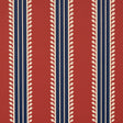 Etruscan Stripe wallpaper in red and blue with multicolored, multiwidth bands and textural details, styled in a classic interior setting.