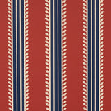 Etruscan Stripe wallpaper in red and blue with multicolored, multiwidth bands and textural details, styled in a classic interior setting.