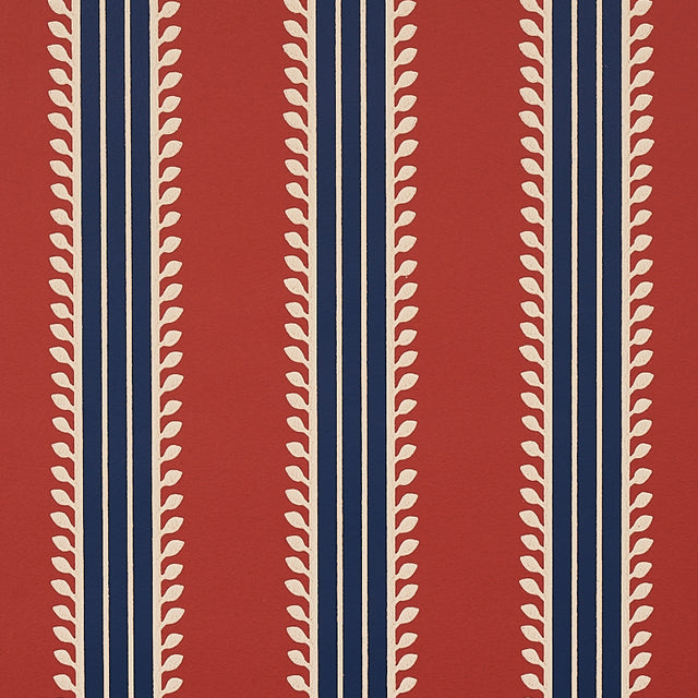 Etruscan Stripe wallpaper in red and blue with multicolored, multiwidth bands and textural details, styled in a classic interior setting.