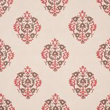 Constantine wallpaper in Jasper by Schumacher, featuring a stylized block print-inspired damask pattern in red and brown tones on a neutral background.