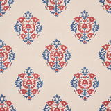 Constantine wallpaper in red and blue by Schumacher, featuring a stylized block print inspired pattern from the Cabana collection.