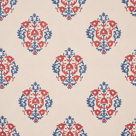 Constantine wallpaper in red and blue by Schumacher, featuring a stylized block print inspired pattern from the Cabana collection.