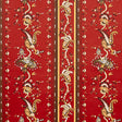 Elena Paisley Stripe wallpaper in Pompeii by Schumacher, featuring a detailed gravure-printed paisley stripe in red and gold tones.