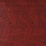 Saz Paisley wallpaper in burgundy by Schumacher, large-scale two-tone paisley pattern, Cabana collection, styled in interior setting.