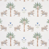 Tiger Palm Delft wallpaper by Schumacher featuring stylized tigers, palm trees, and Ottoman flowers in blue and green on a white background.
