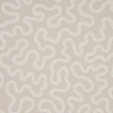 RILEY wallpaper in Natural by Schumacher features a modern vermicelli pattern in a neutral colorway, shown in a styled interior and close-up views.