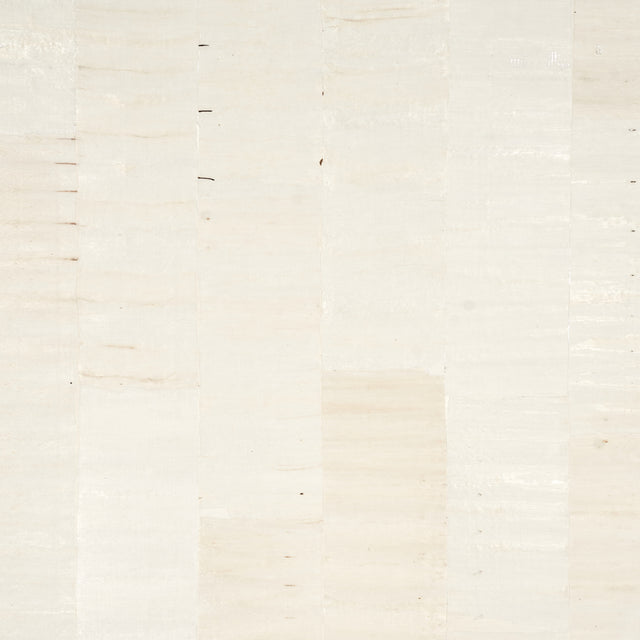 Sano Mosaic white wallcovering with organic, hand-pieced squares and subtle texture by Schumacher