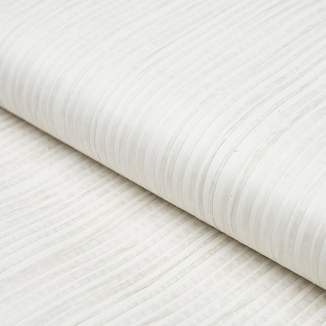 Paper Stripe in white wallcovering by Schumacher, featuring subtle matte and gloss vertical stripes with hand-applied paper strips.