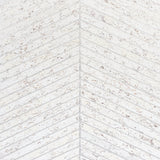 Cork Herringbone white wallcovering with natural cork texture and metallic flecks in a herringbone pattern by Schumacher.