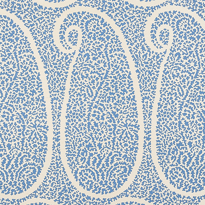 Ambala Paisley Sisal wallpaper in bright blue, featuring a large-scale paisley pattern with intricate details, printed on sisal grasscloth.