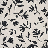 Laurel wallpaper in black by Schumacher, featuring bold hand-drawn botanical silhouettes on a light background.