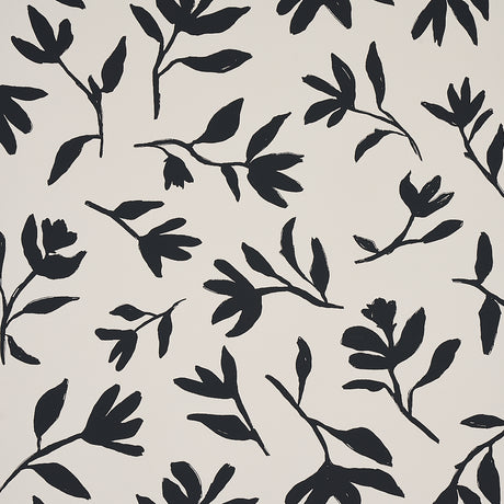 Laurel wallpaper in black by Schumacher, featuring bold hand-drawn botanical silhouettes on a light background.