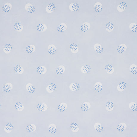 Taylor Blues wallpaper by Schumacher featuring offset-printed bursts of tiny blue dots over a field of larger dots, shown in a modern interior setting.