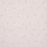 Taylor Pink wallpaper by Schumacher featuring offset-printed bursts of tiny dots over a field of larger dots, shown in a bathroom setting.