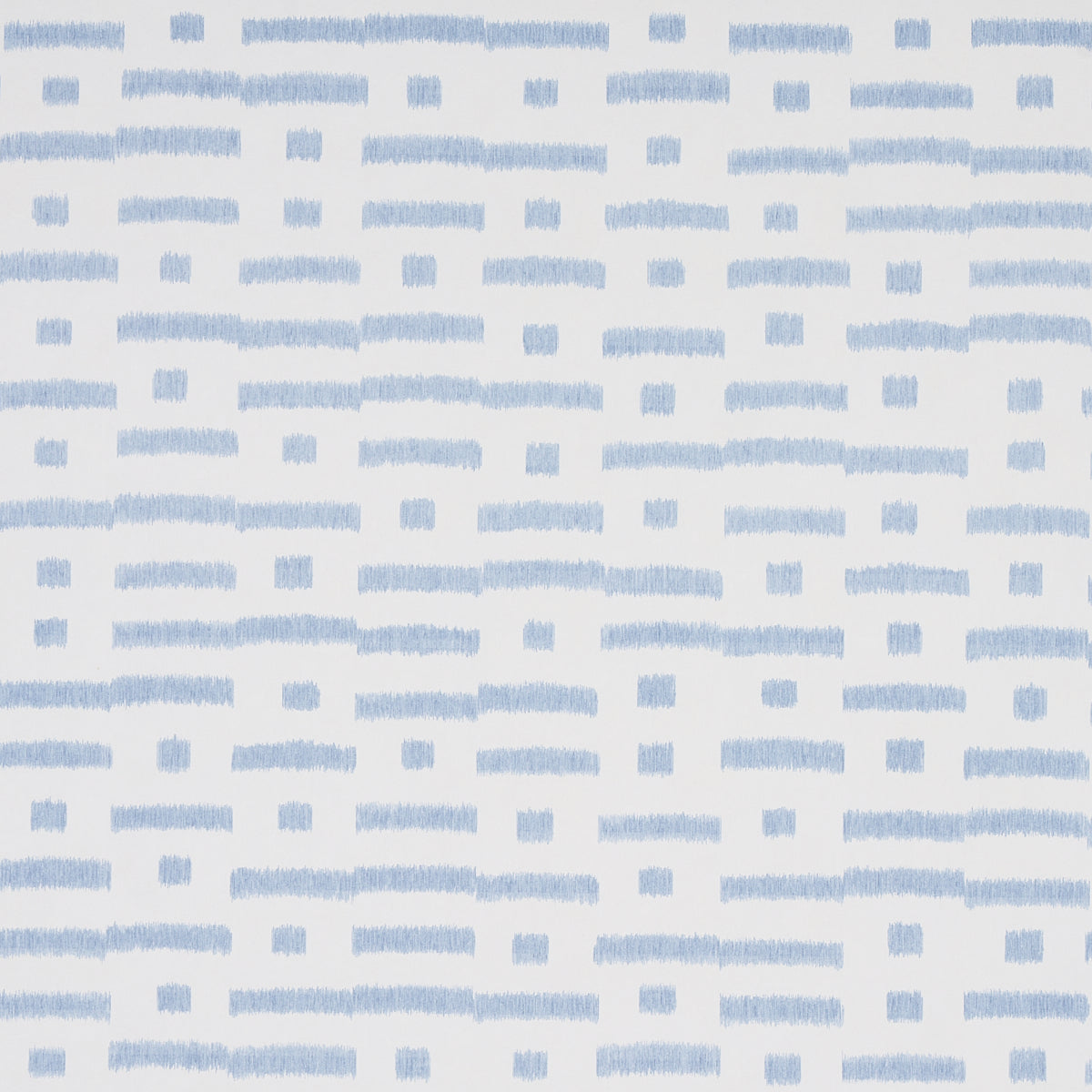 Abstract Ikat Sky wallpaper by Schumacher, featuring a rhythmic broken-stripe pattern in blue on white, shown in a modern living room setting.