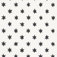 Astral wallpaper in black by Schumacher, featuring small six-pointed stars in offset rows, designed by Hobe Erwin.