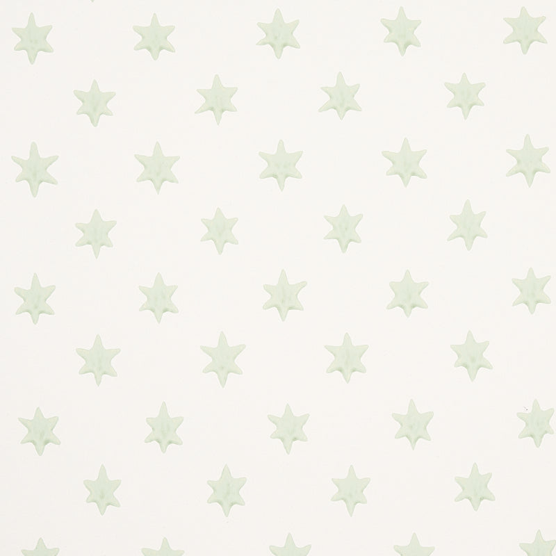 Astral green wallpaper by Schumacher featuring small six-pointed stars in a delicate, celestial pattern.