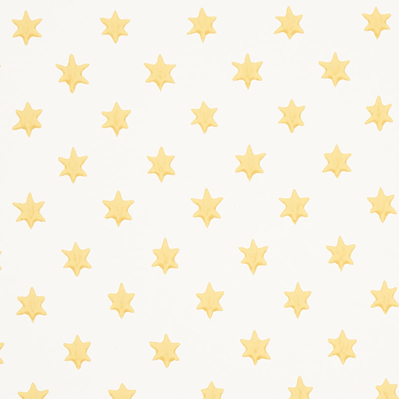 Astral yellow wallpaper by Schumacher featuring small six-pointed stars in a repeating pattern, designed by Hobe Erwin.