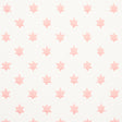 Astral pink wallpaper by Schumacher featuring small six-pointed stars in neat offset rows, designed by Hobe Erwin.