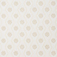 Hive Bloom wallpaper in sand colorway by Schumacher, featuring a geometric floral pattern from the Hobe Erwin collection, shown in a styled bedroom setting.