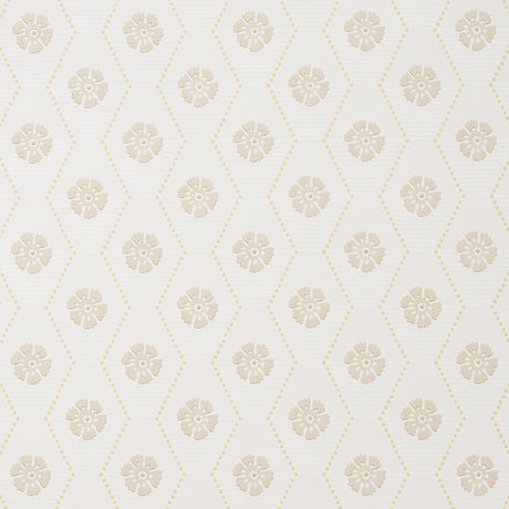 Hive Bloom wallpaper in sand colorway by Schumacher, featuring a geometric floral pattern from the Hobe Erwin collection, shown in a styled bedroom setting.